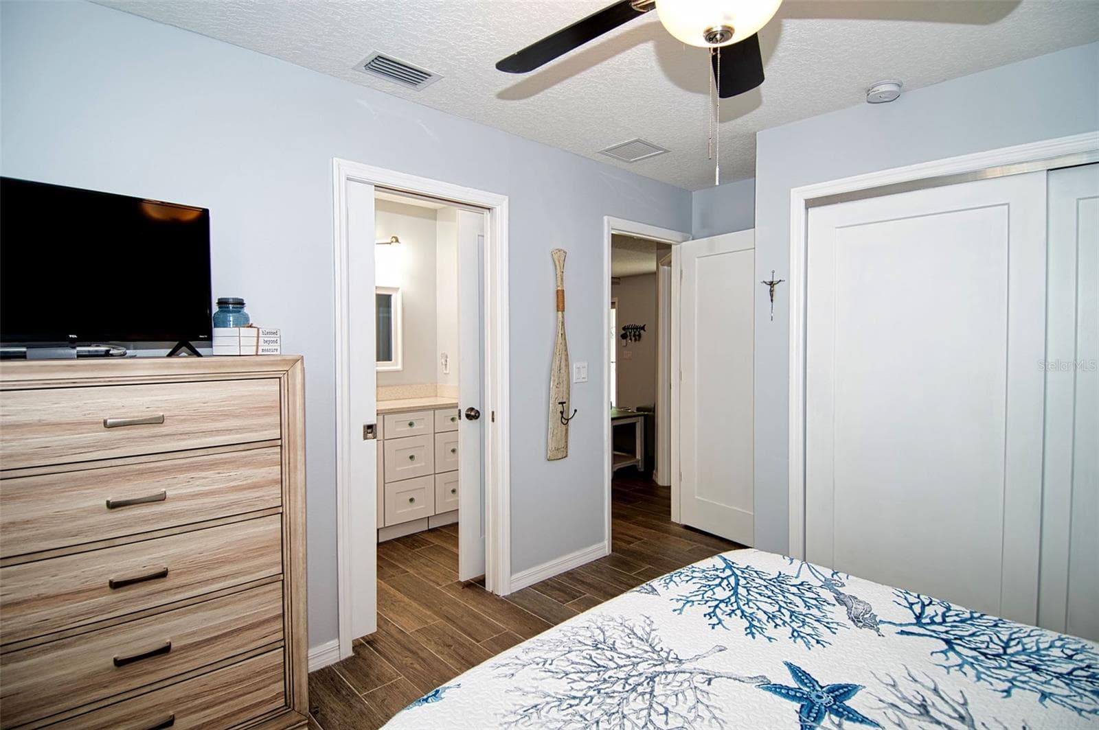Another view of Master Bedroom with full wall closet and Bath access. - 6420 BOATYARD DR, HUDSON