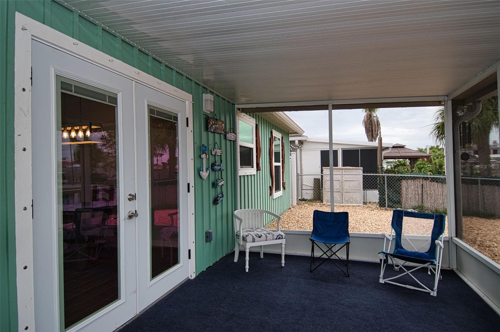 Another view of backyard porch. - 6420 BOATYARD DR, HUDSON