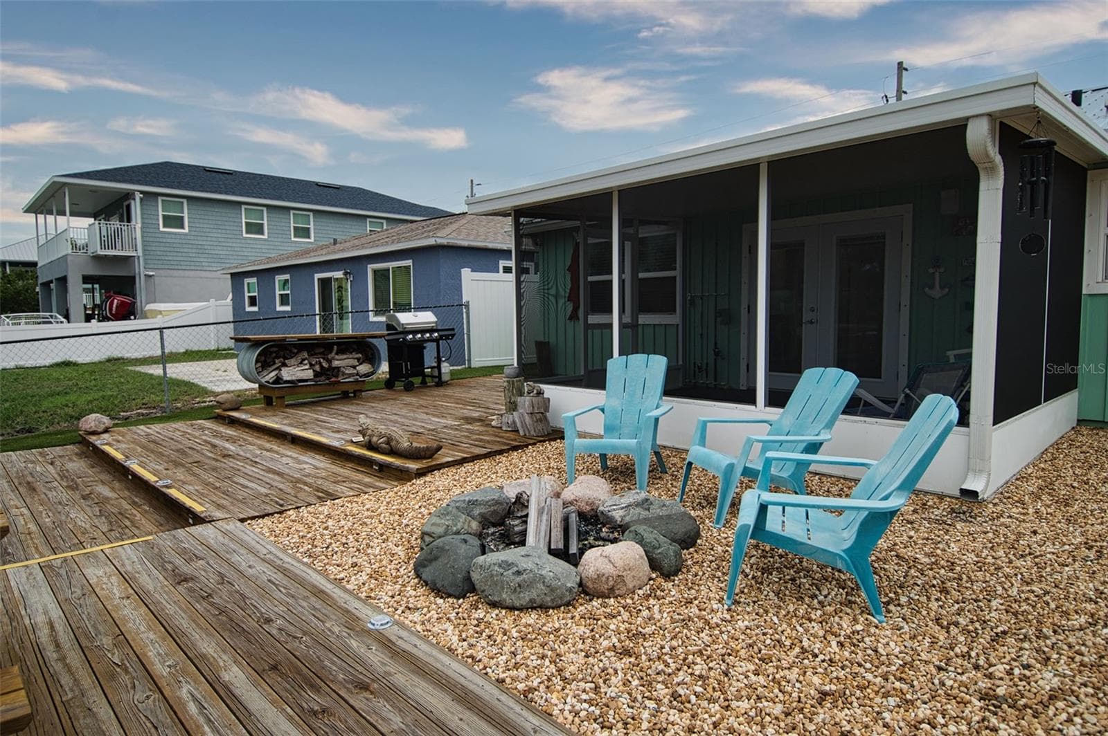 Enjoy visiting with friends or just enjoying a Summer Breeze in your backyard space. - 6420 BOATYARD DR, HUDSON