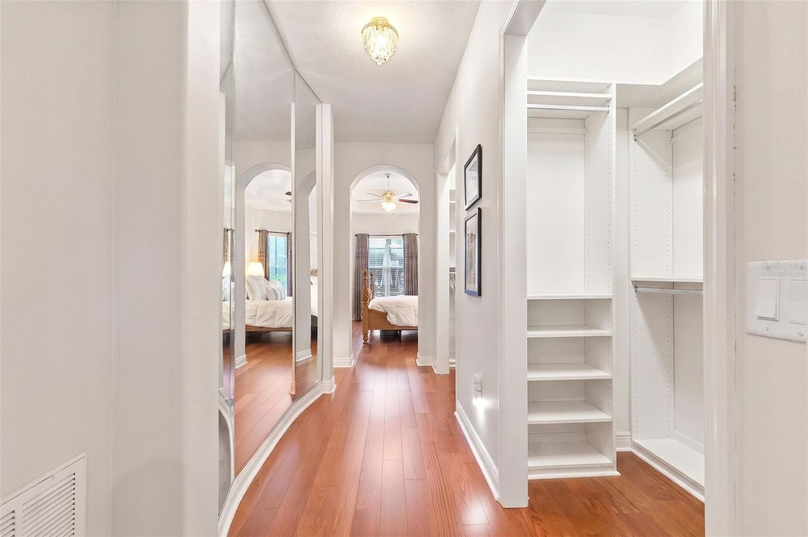 Virtually staged- Primary Walk-In Custom Closet Two - 20203 CANE RIVER WAY, TAMPA