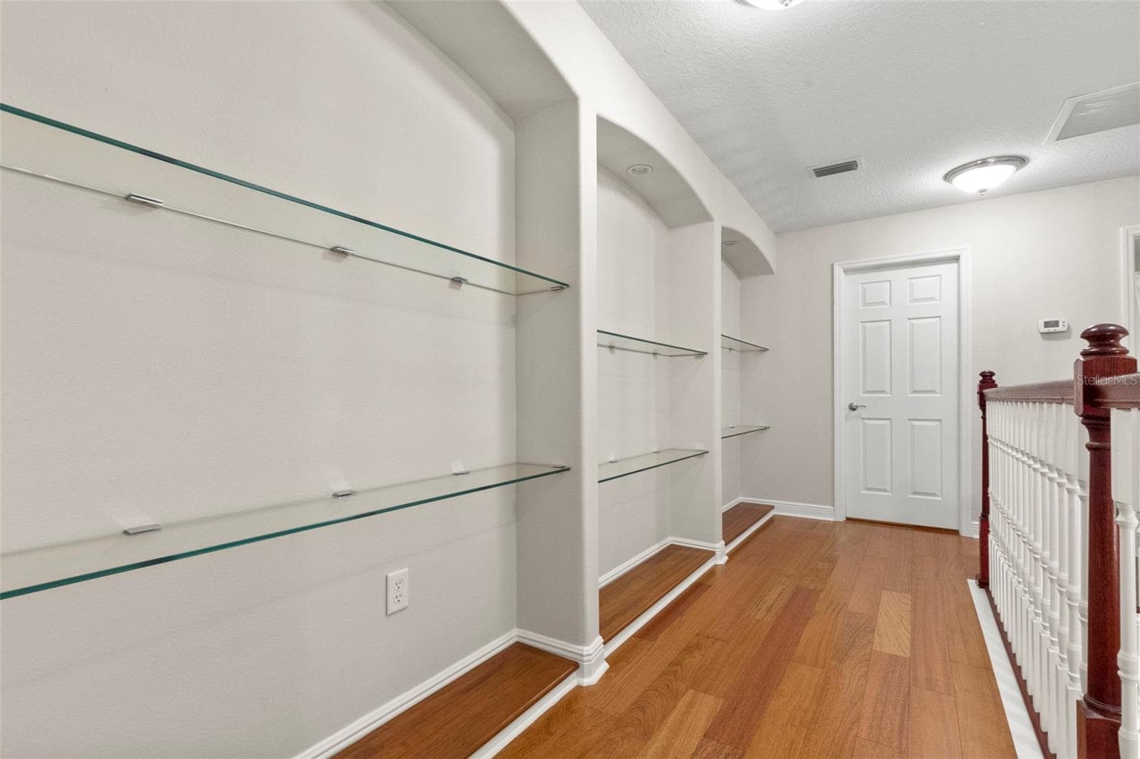 Library-Updated Glass Shelving - 20203 CANE RIVER WAY, TAMPA