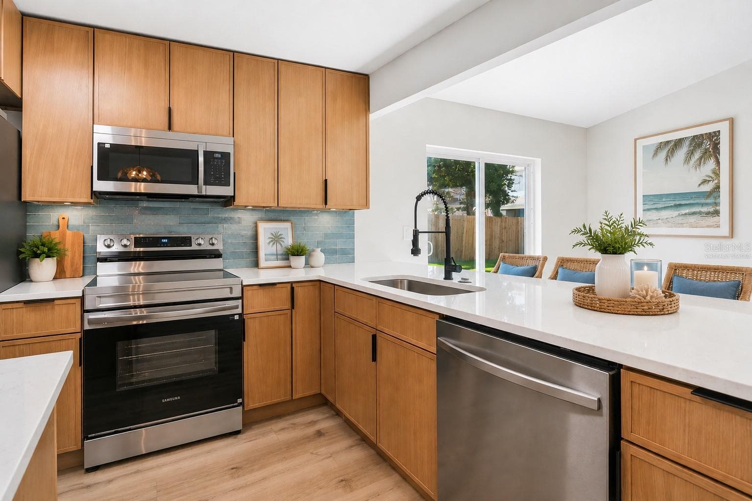 Virtually Staged. Buyer can choose their own backsplash from options at the property for installation prior to closing. - 1101 54TH AVE S, ST PETERSBURG
