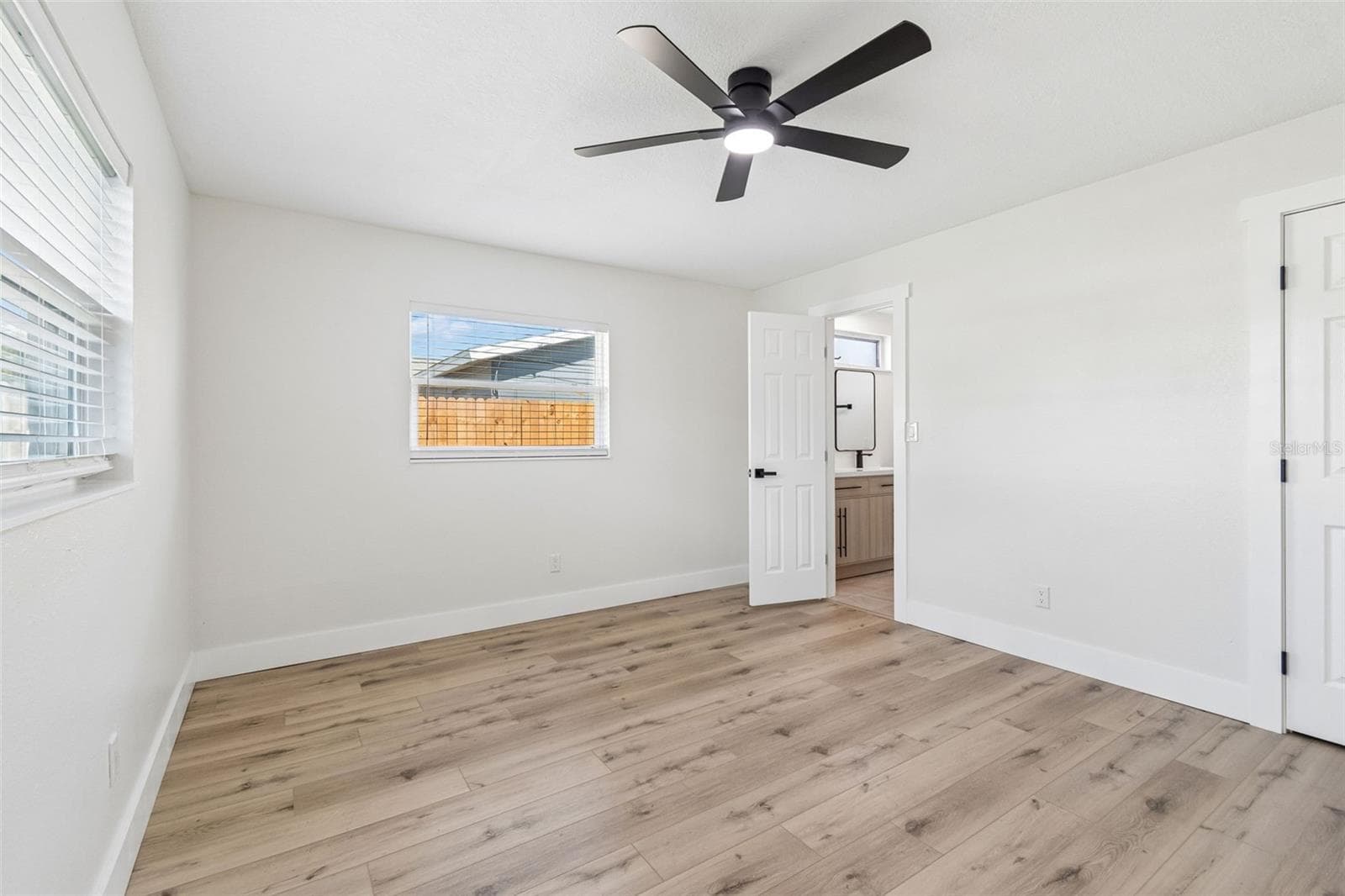 Spacious primary bedroom. - 1101 54TH AVE S, ST PETERSBURG