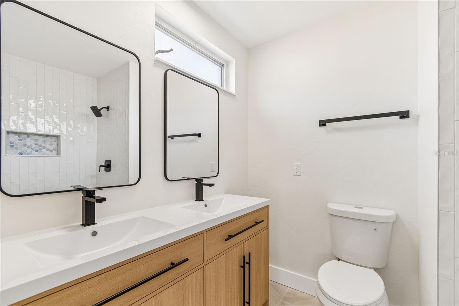 Primary on suite bathroom. - 1101 54TH AVE S, ST PETERSBURG