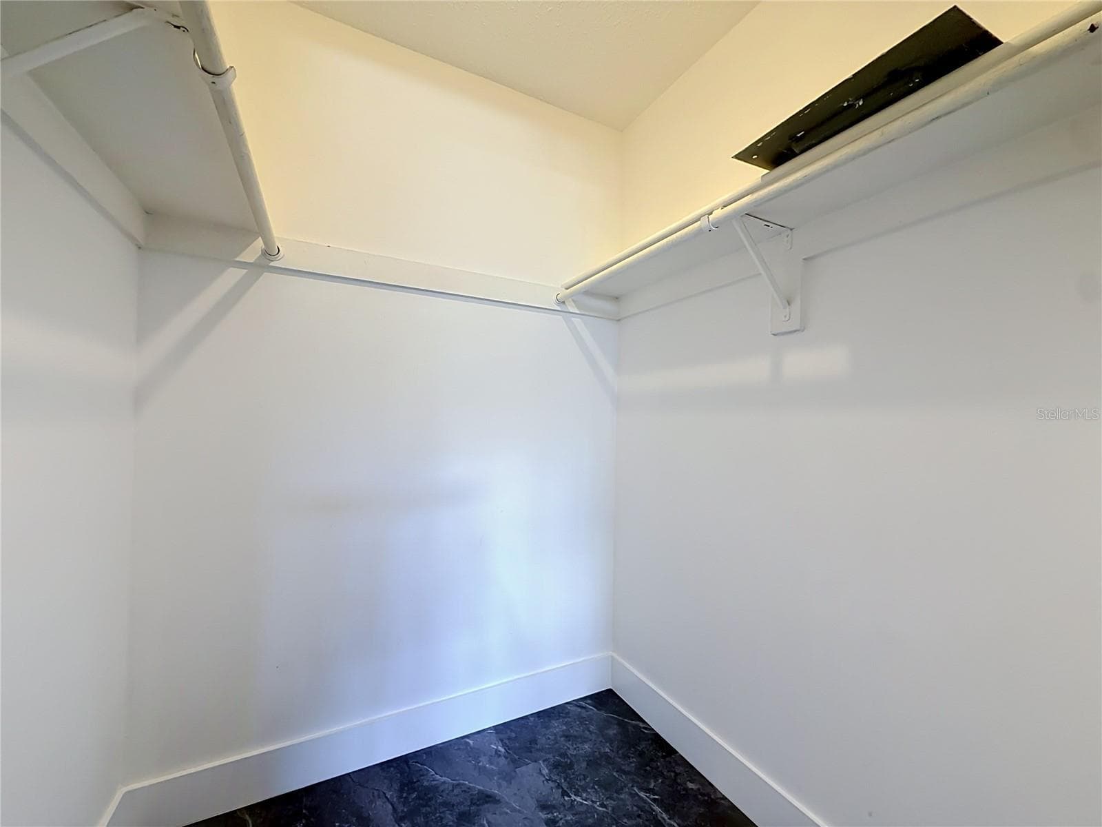 walk-in closet in bedroom - 3018 59TH ST S #102, GULFPORT