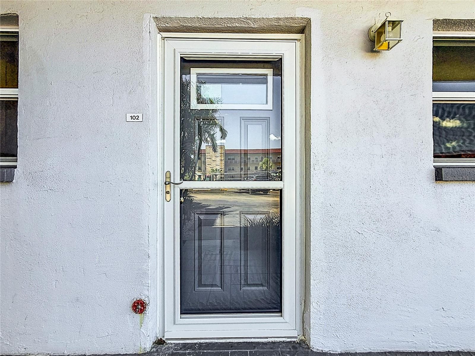new impact door and new storm door - 3018 59TH ST S #102, GULFPORT
