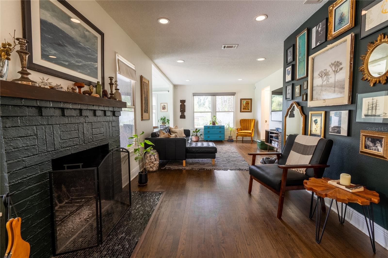 View of fireplace from kitchen - 795 30TH ST, ORLANDO