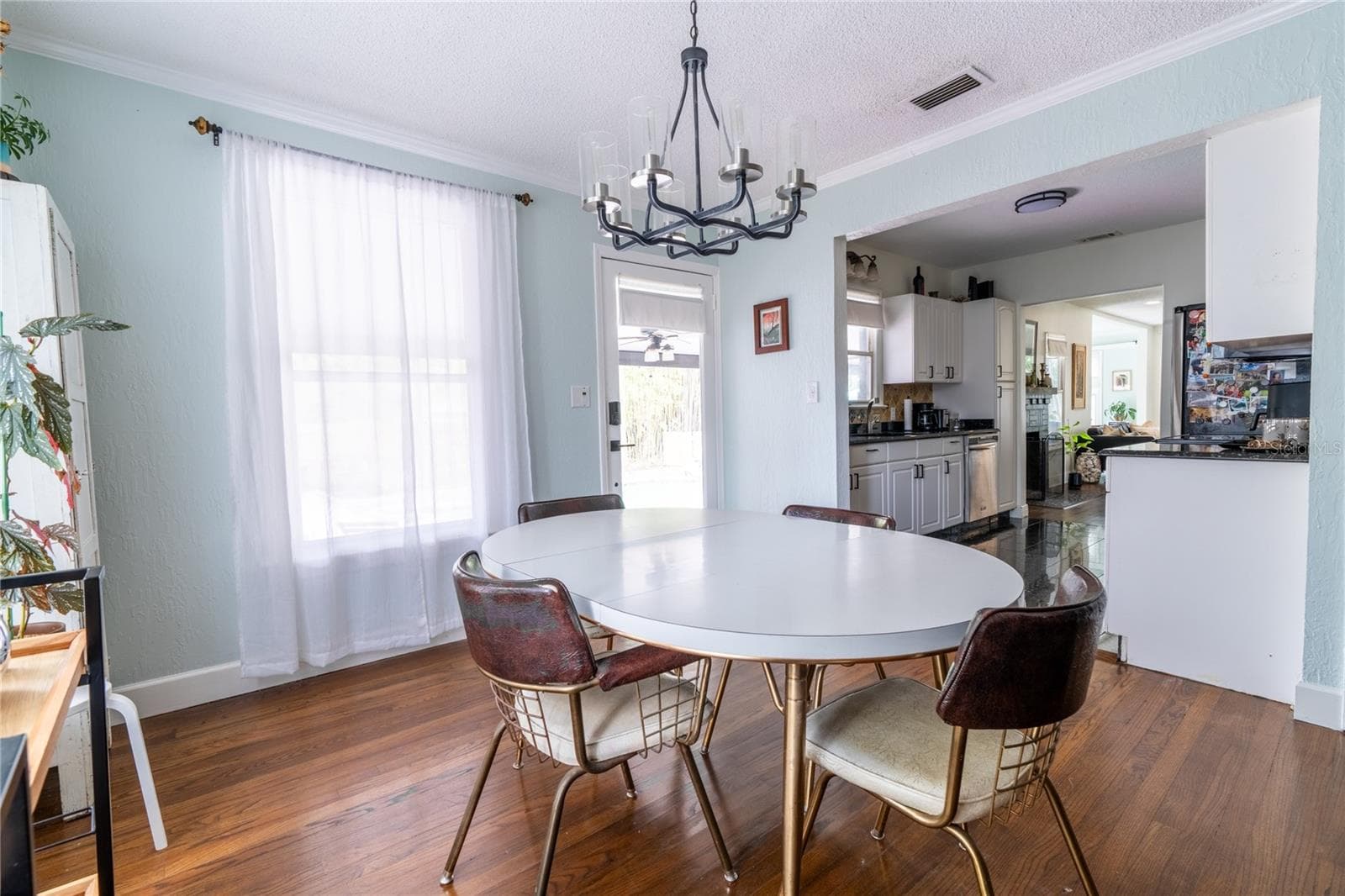Dining area directly off kitchen and outdoor access to resort style pool! - 795 30TH ST, ORLANDO