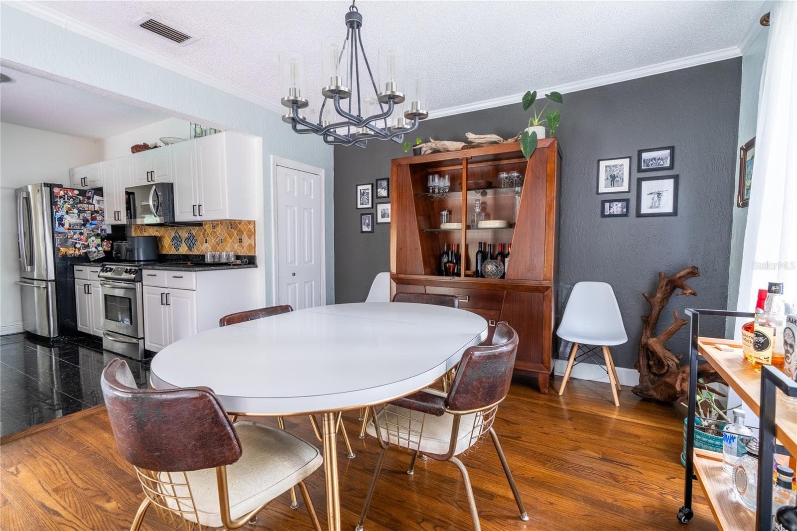 Dining area directly off kitchen and outdoor access to resort style pool! - 795 30TH ST, ORLANDO