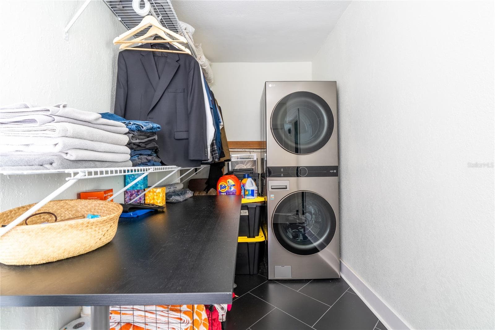 Primary bedroom closet with convenient laundry room built in! - 795 30TH ST, ORLANDO