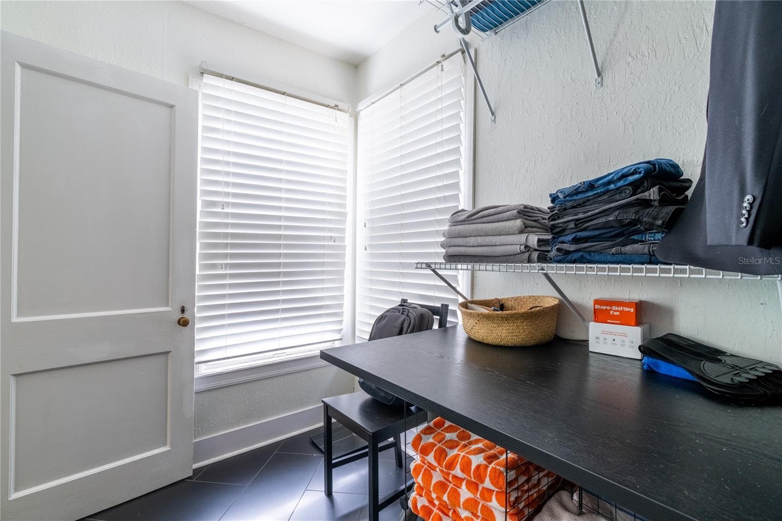 Primary bedroom closet with convenient laundry room built in! - 795 30TH ST, ORLANDO