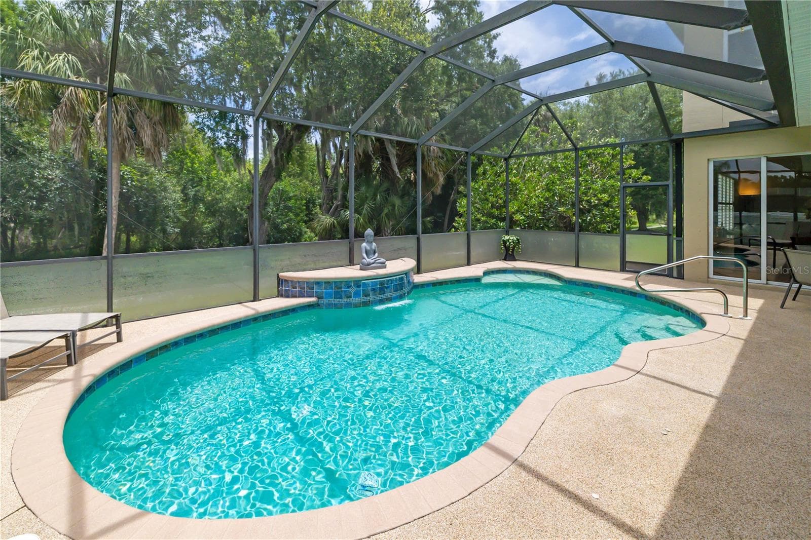 Tranquil oversized pool and undercover area for enjoying the year round Florida sunshine, rubberized pool deck surface for the the young ones enjoyment, heated pool - 12471 NATUREVIEW CIR, BRADENTON