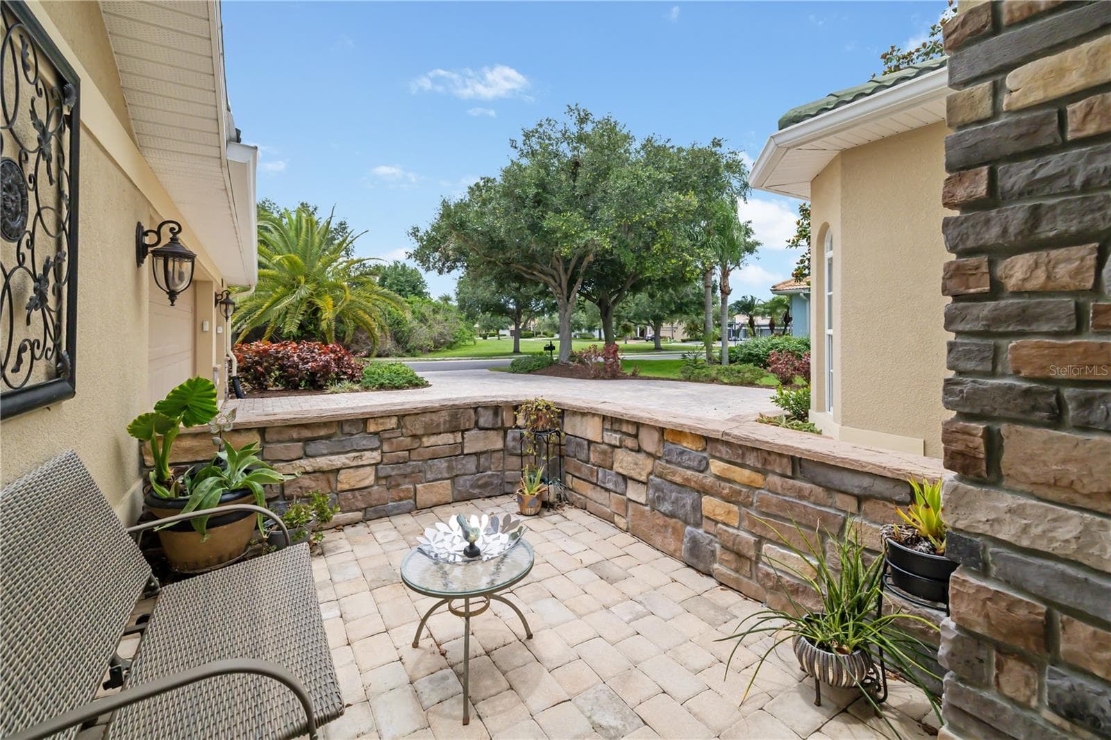 Front porch sitting area, easy to enjoy morning time in paradise - 12471 NATUREVIEW CIR, BRADENTON