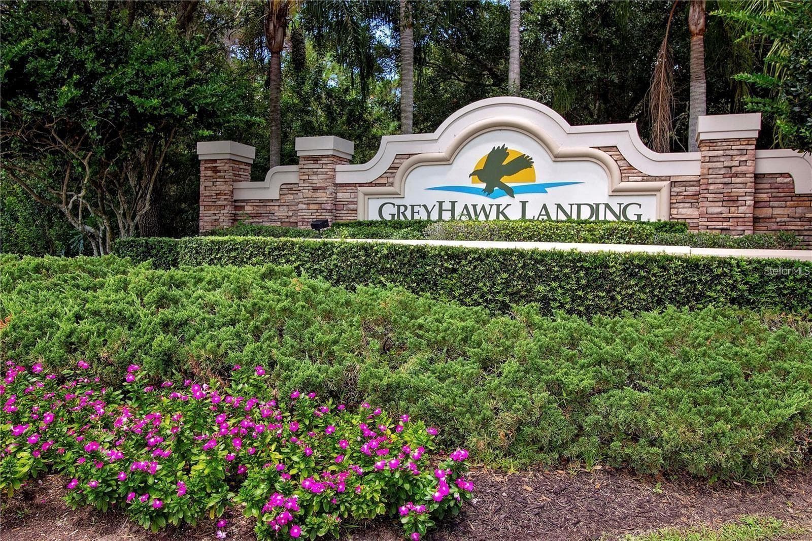 Greyhawk Landing front entrance gated guard entry, fencing is allowed, low HOA with resort style amenities - 12471 NATUREVIEW CIR, BRADENTON