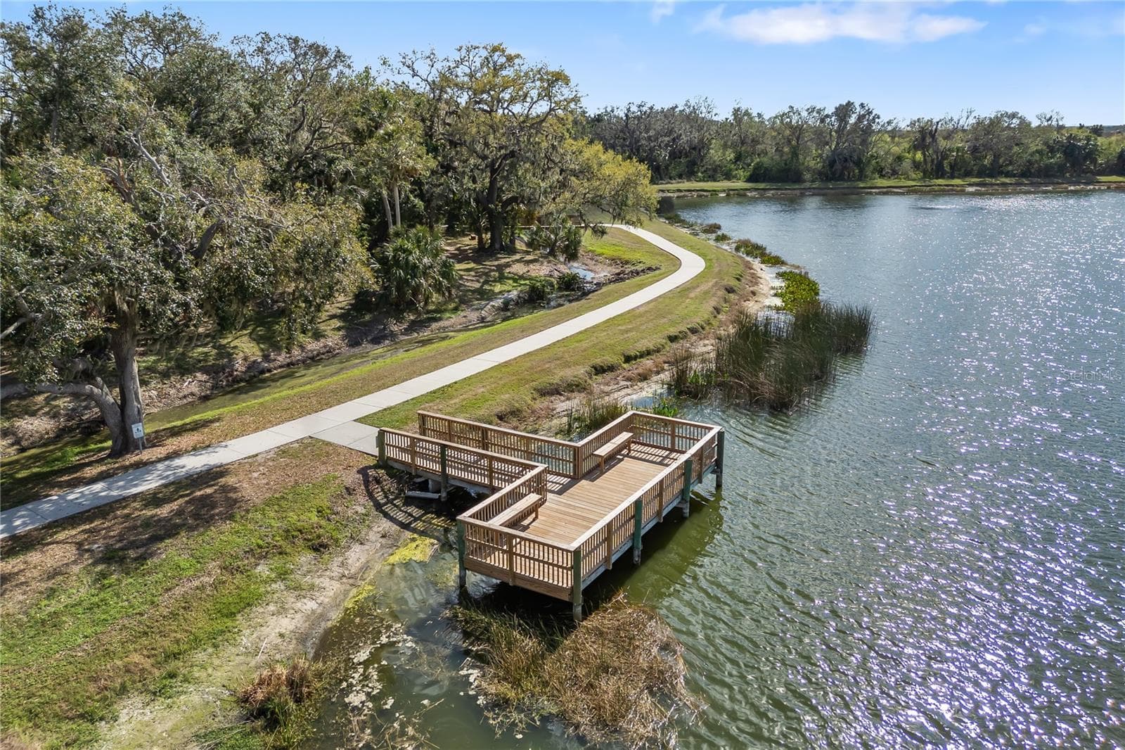 Greyhawk Landing fishing pier with dock is perfect for enjoying all the out of town grandkids, guests - 12471 NATUREVIEW CIR, BRADENTON