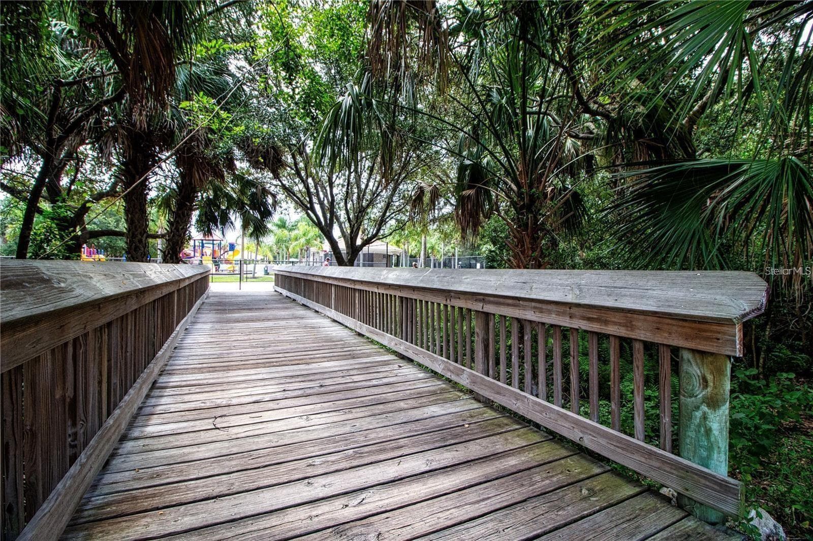Greyhawk Landing bridge connecting East and West community - 12471 NATUREVIEW CIR, BRADENTON