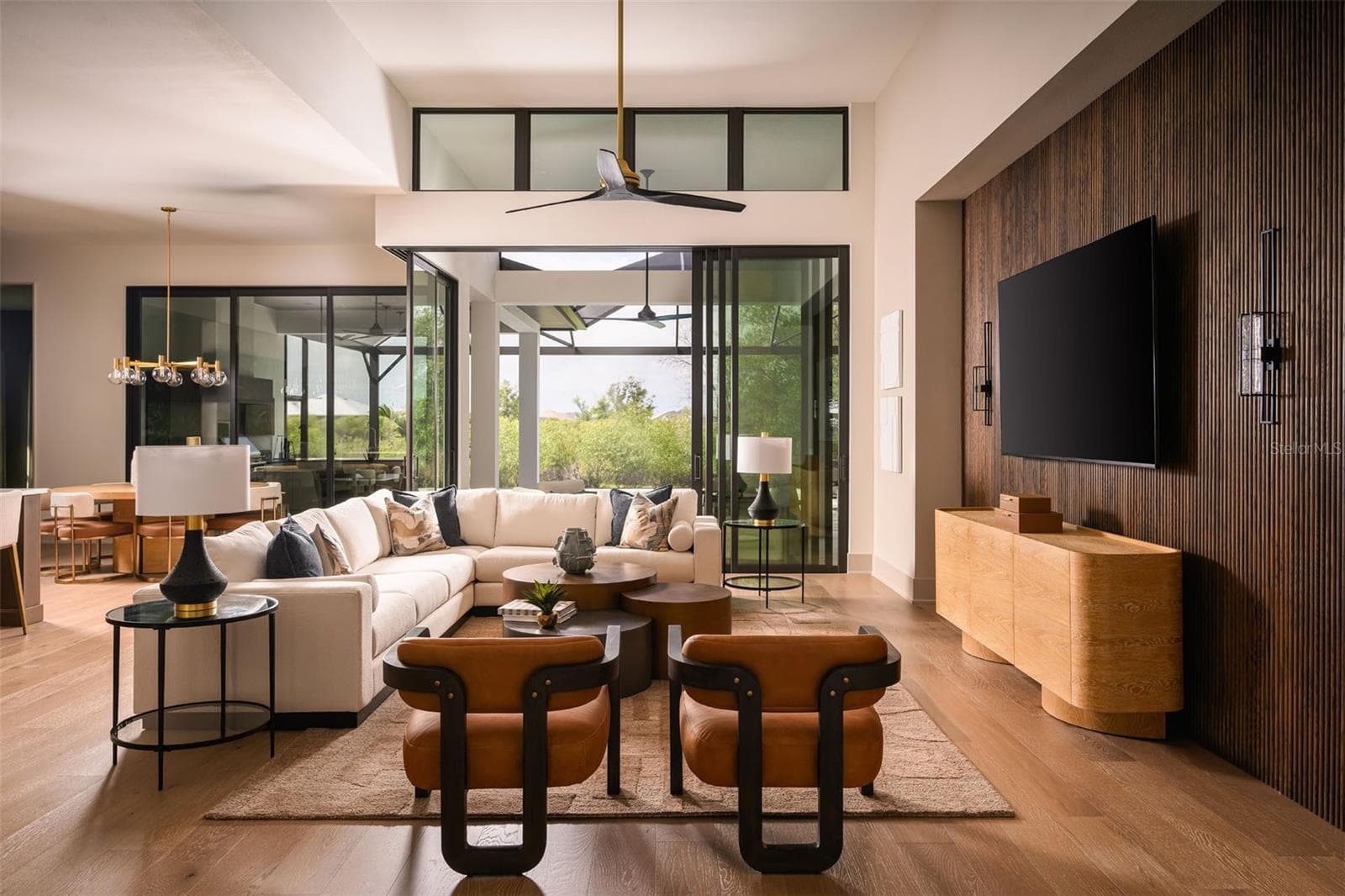 Great room (photo from Lago model) - 8613 SANDPOINT ST, SARASOTA