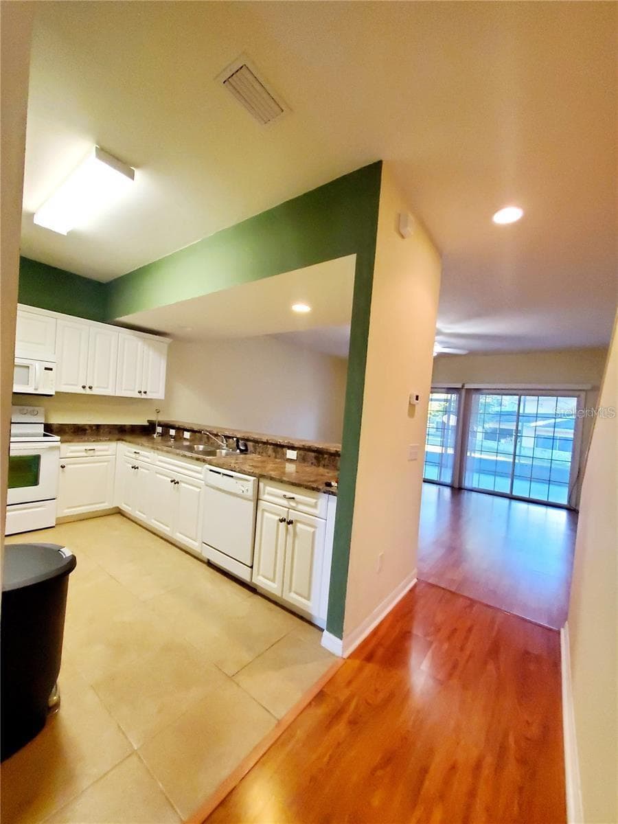 Kitchen entrance (green is gone now) - 1561 NW 29TH RD #8, GAINESVILLE