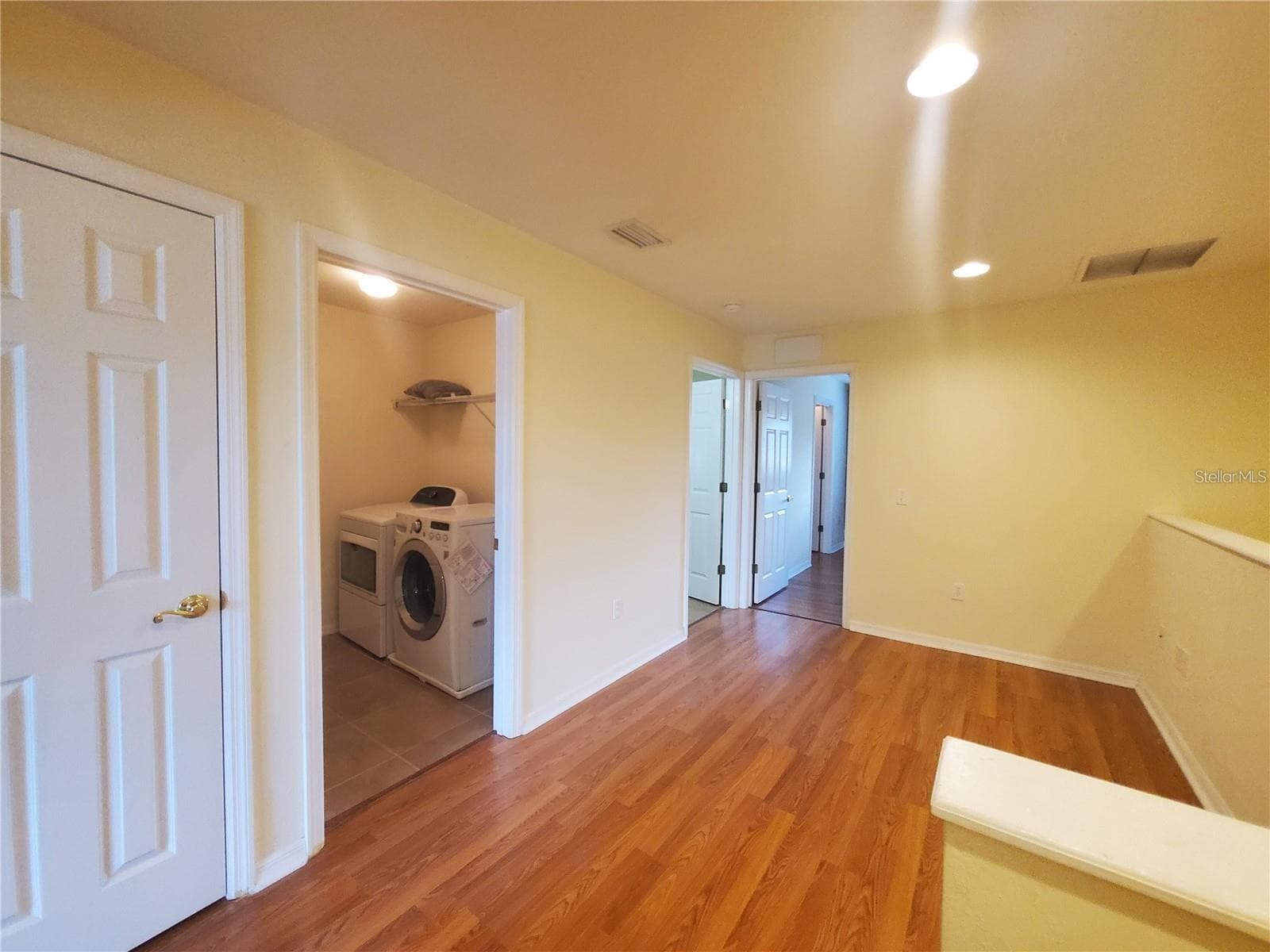 Upstairs bonus area and laundry entrance - 1561 NW 29TH RD #8, GAINESVILLE