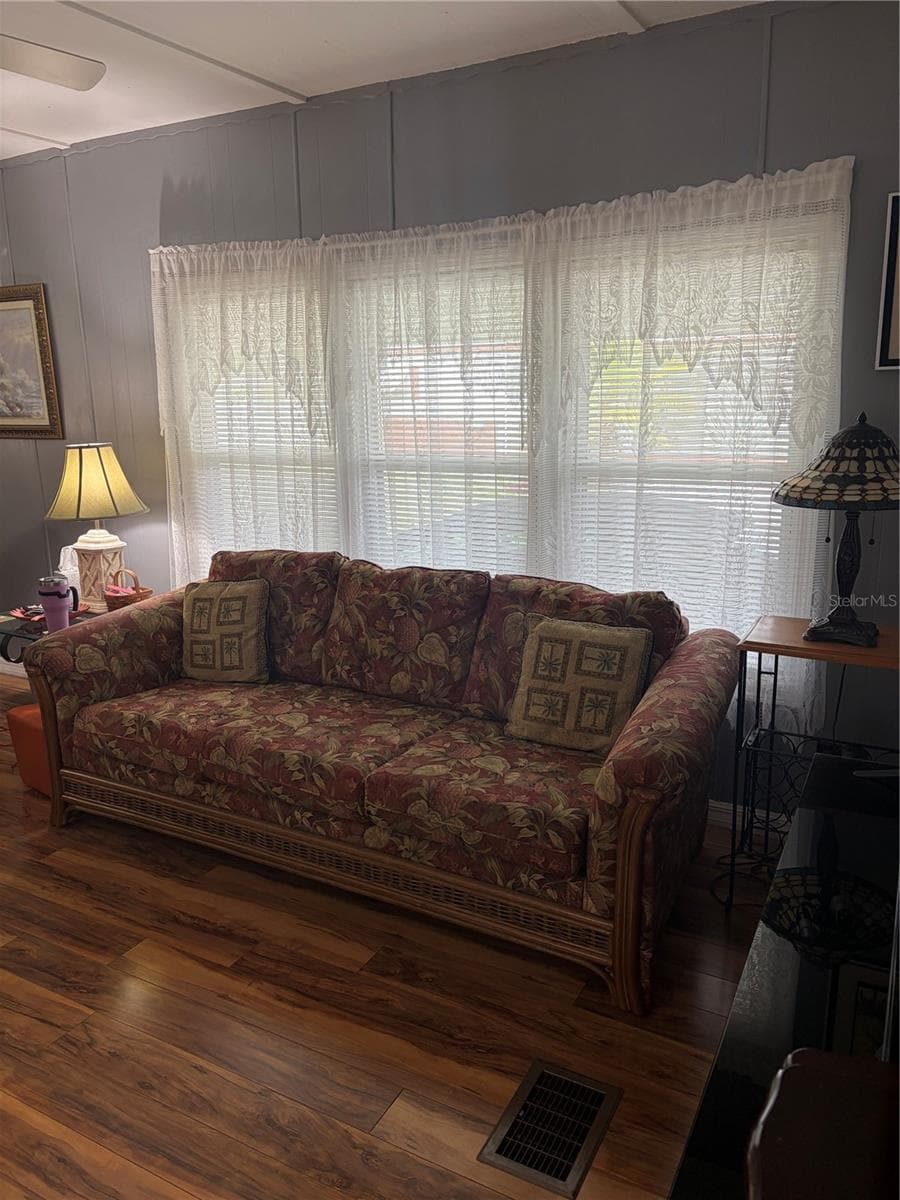 Triple window behind the sofa lends plenty of light. - 723 ROMA RD, VENICE
