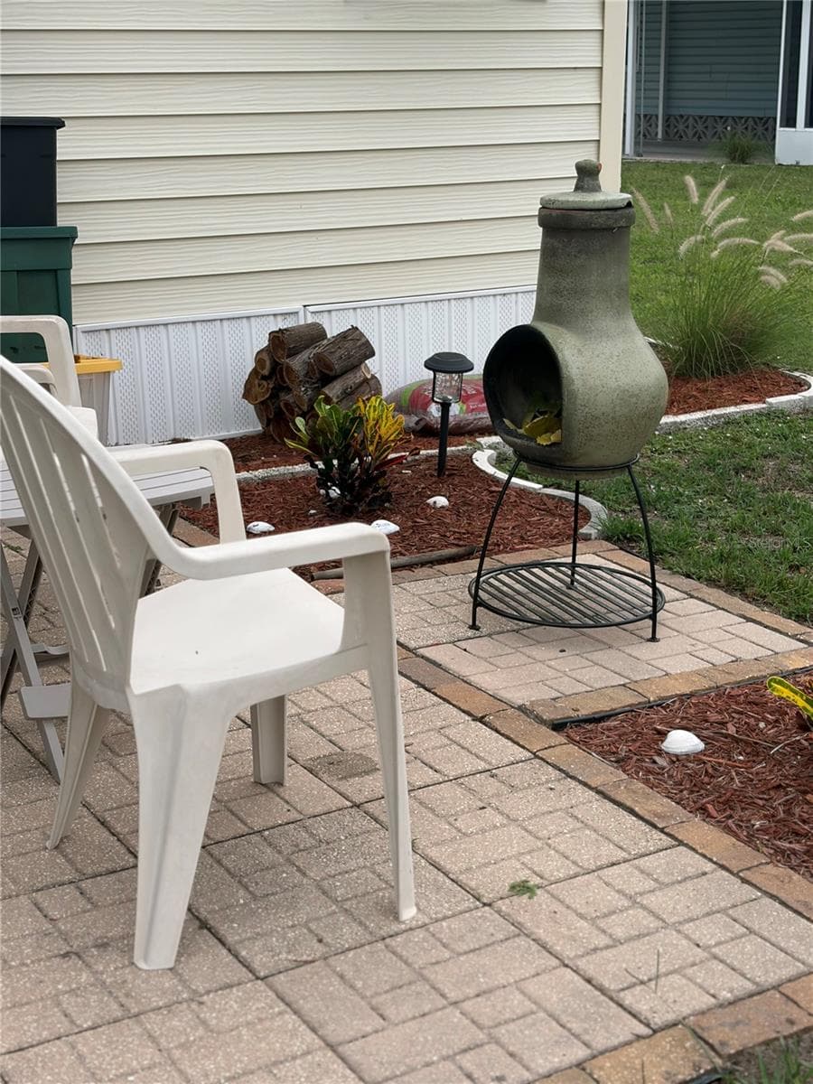 Enjoy a peaceful time in front of the stove for those cooler nights. - 723 ROMA RD, VENICE