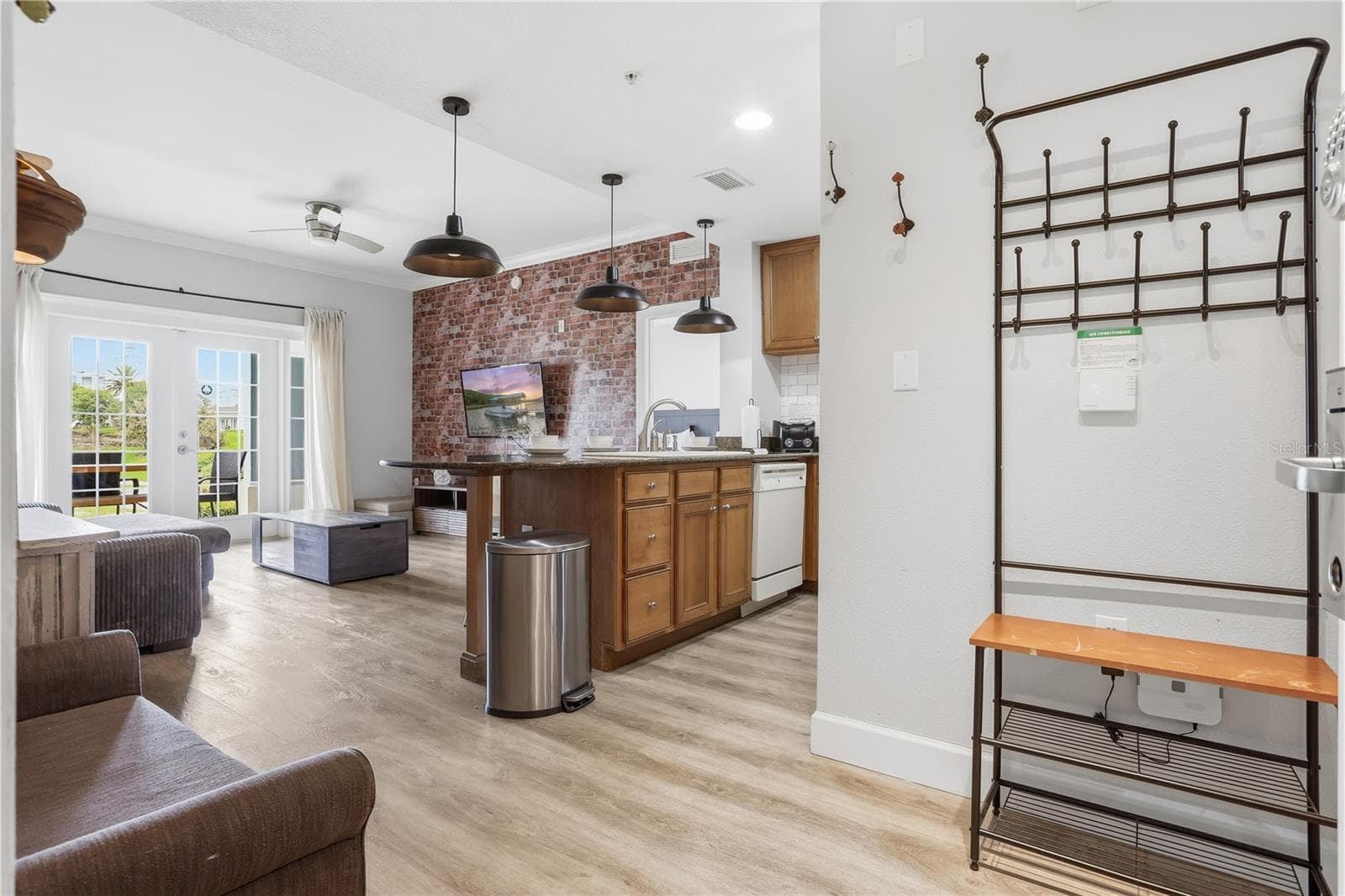 Freshly updated kitchen with a bright, modern feel. - 7673 HERITAGE CROSSING WAY #102, REUNION