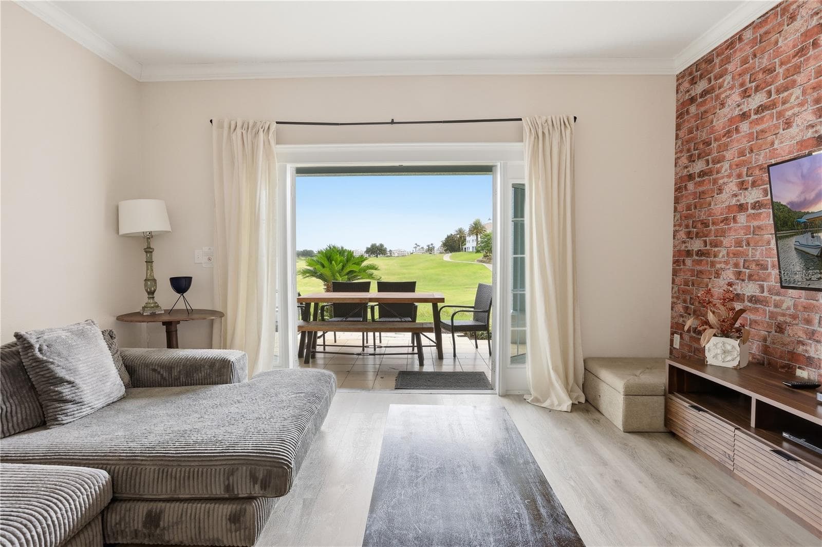 Floor has been recently replaced so no carpets for easy menaitance - 7673 HERITAGE CROSSING WAY #102, REUNION