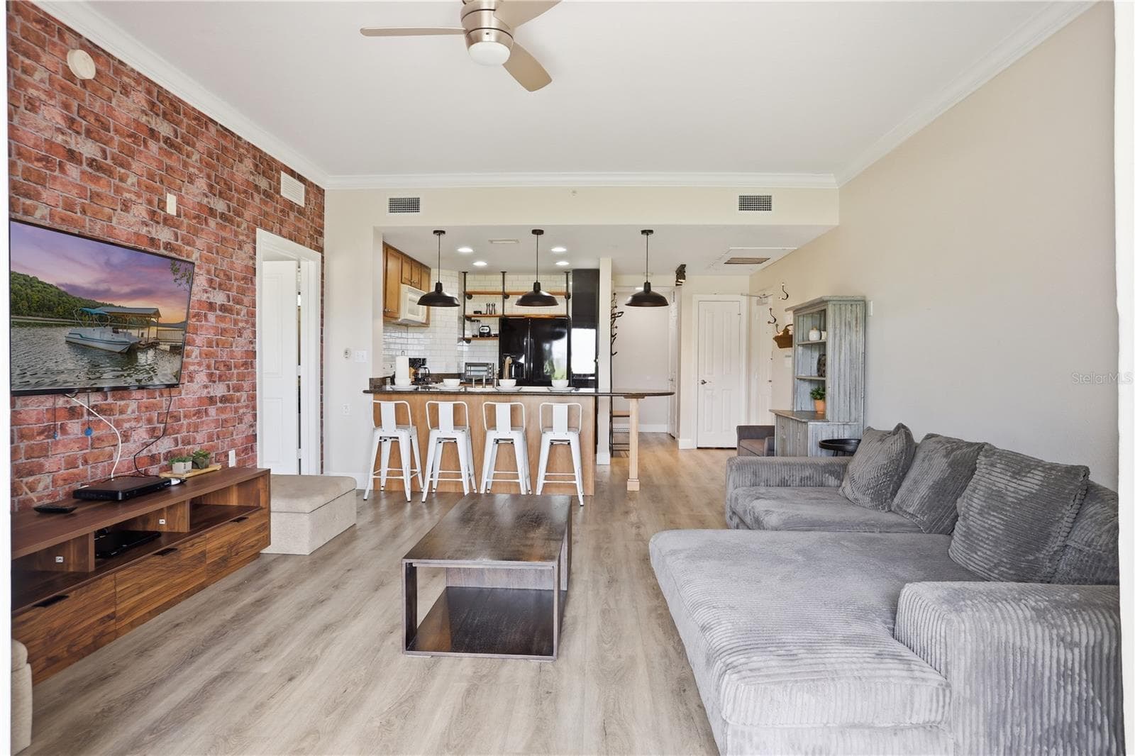 Bright, open floor plan designed for comfortable living and easy entertaining. - 7673 HERITAGE CROSSING WAY #102, REUNION