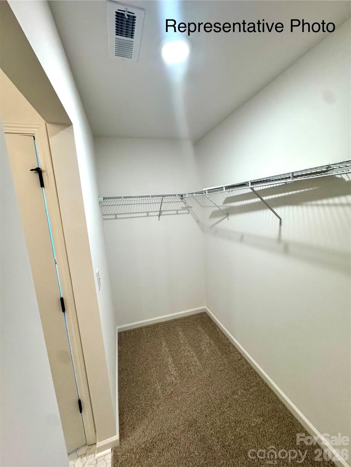 Primary Bedroom walk in closet - 407 Drawbar Drive, Clover