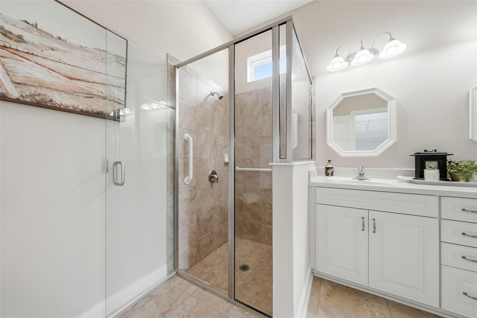Tiled walk-in shower in Primary bathroom - 16716 ABBEY HILL CT, CLERMONT