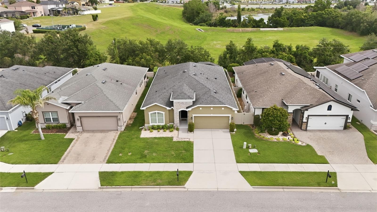 Aerial front view of home - 16716 ABBEY HILL CT, CLERMONT