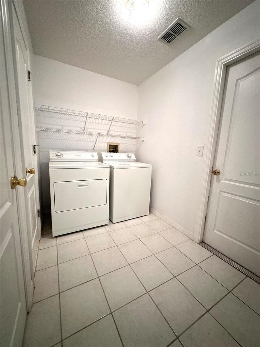 laundry room - 29439 SCHINNECOCK HILLS LN, SAN ANTONIO