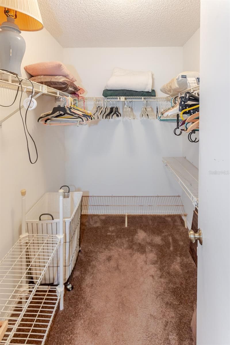 Primary walk-in closet - 7560 ST ANDREWS BLVD #7560, WEEKI WACHEE