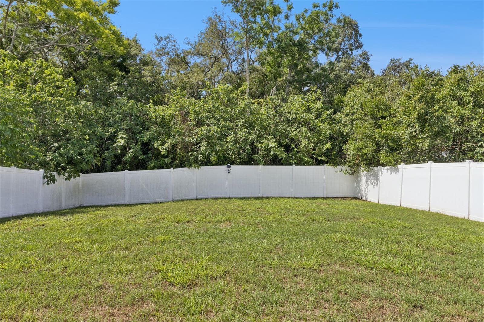 Fenced backyard - 2505 BAKER AVE E, HAINES CITY
