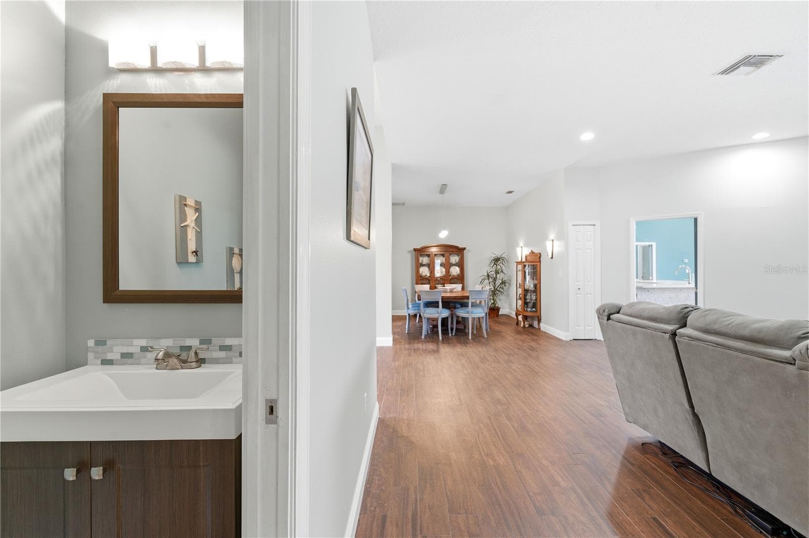 Half Bathroom conveniently located off of the living room. - 17024 WINNERS CIR, ODESSA