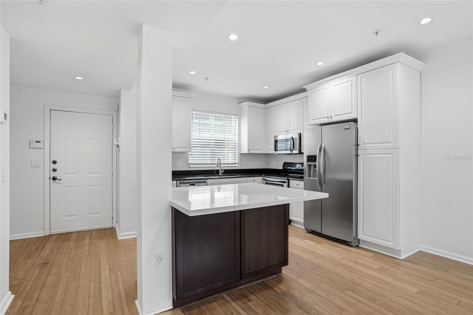 Kitchen and the door leads to the pool and Hyde Park Village - 809 S OREGON AVE #B, TAMPA