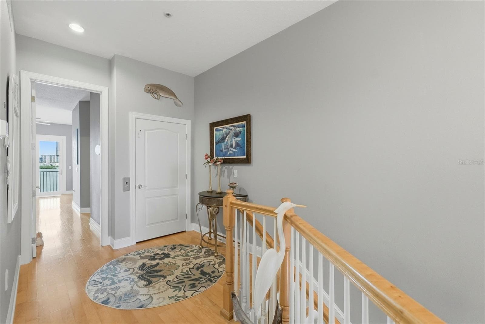 Stairway up to the third level (don't forget, you can also take the private elevator!) which includes the master, guest bedroom on opposite end and the laundry room. - 200 BRIGHTWATER DR #10, CLEARWATER BEACH