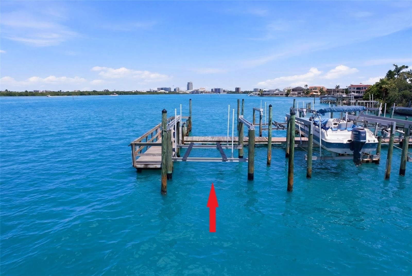 Assigned 30ft deep water boat slip with a 10,000-pound lift, water and electric. The Dock deck and rails are currently being replaced; no assessment, all reserves. - 200 BRIGHTWATER DR #10, CLEARWATER BEACH
