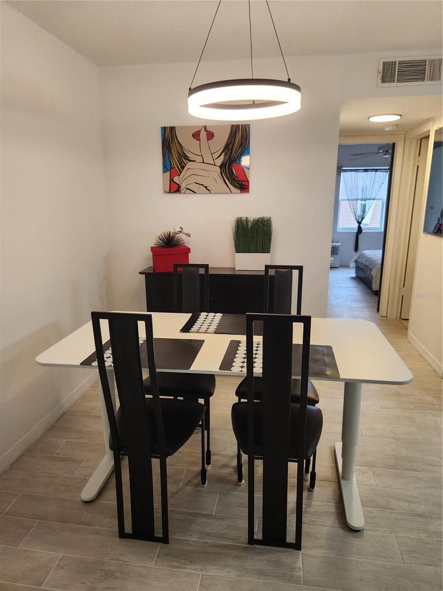 Open concept with newer fixtures throughout - 9101 W HILLSBOROUGH AVE #I209, TAMPA
