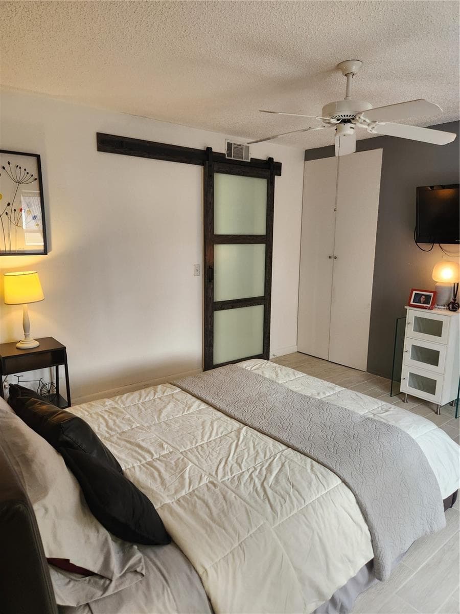 Modern 8' closet doors & bedroom barn door - 9101 W HILLSBOROUGH AVE #I209, TAMPA