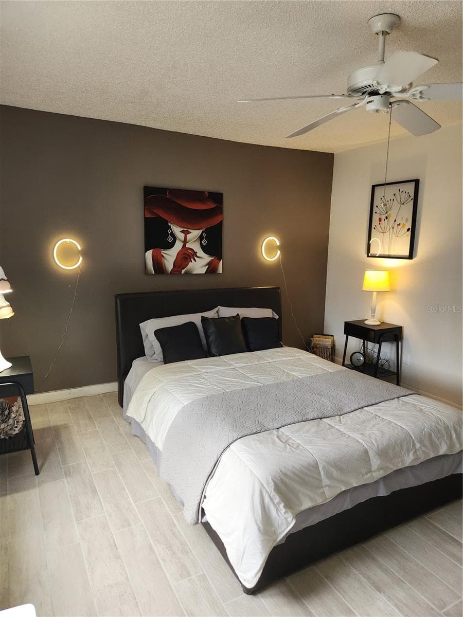 Spacious bedroom. Fits king size comfortably. - 9101 W HILLSBOROUGH AVE #I209, TAMPA