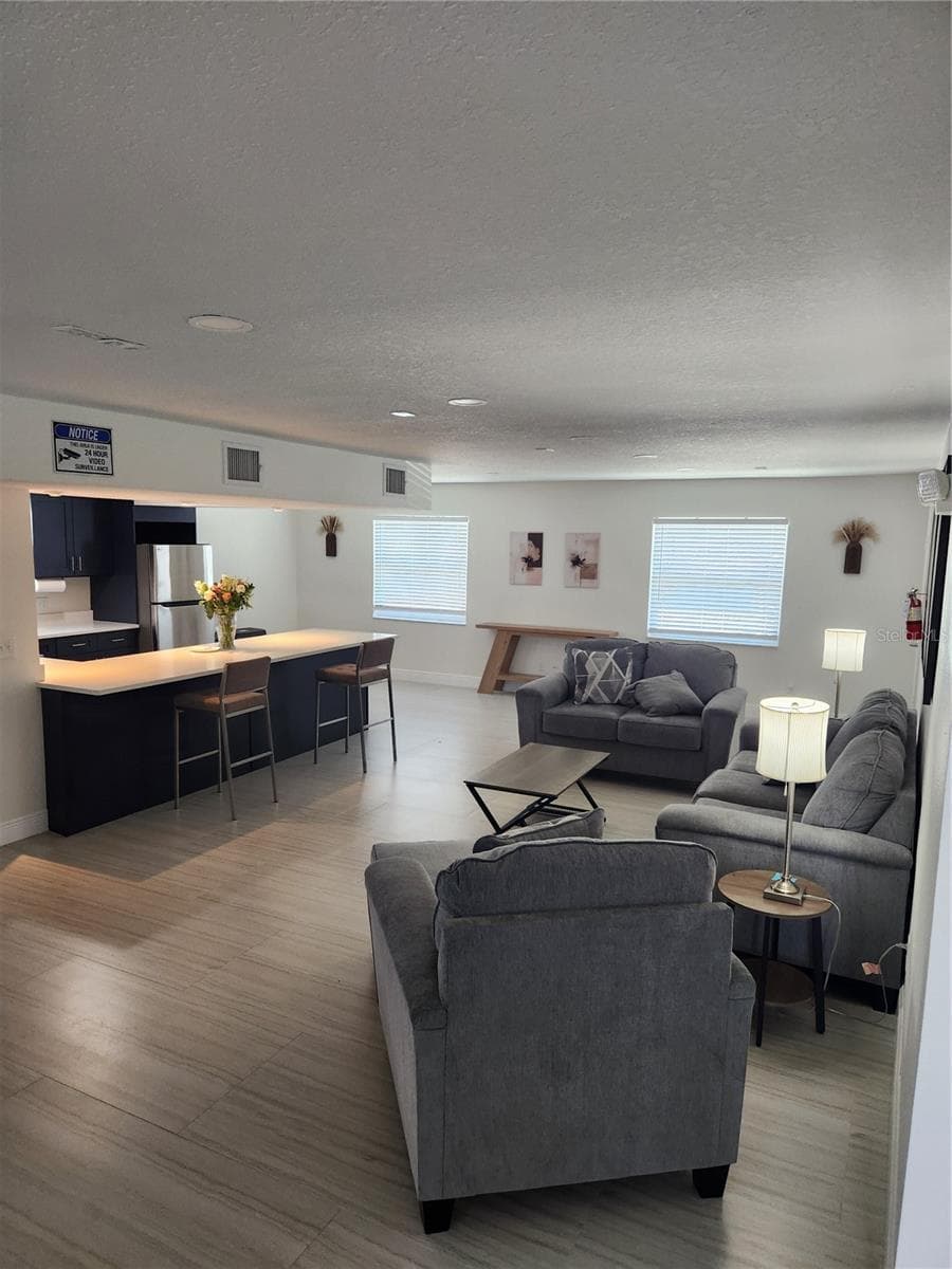 Clubhouse Living Room & kitchen - 9101 W HILLSBOROUGH AVE #I209, TAMPA