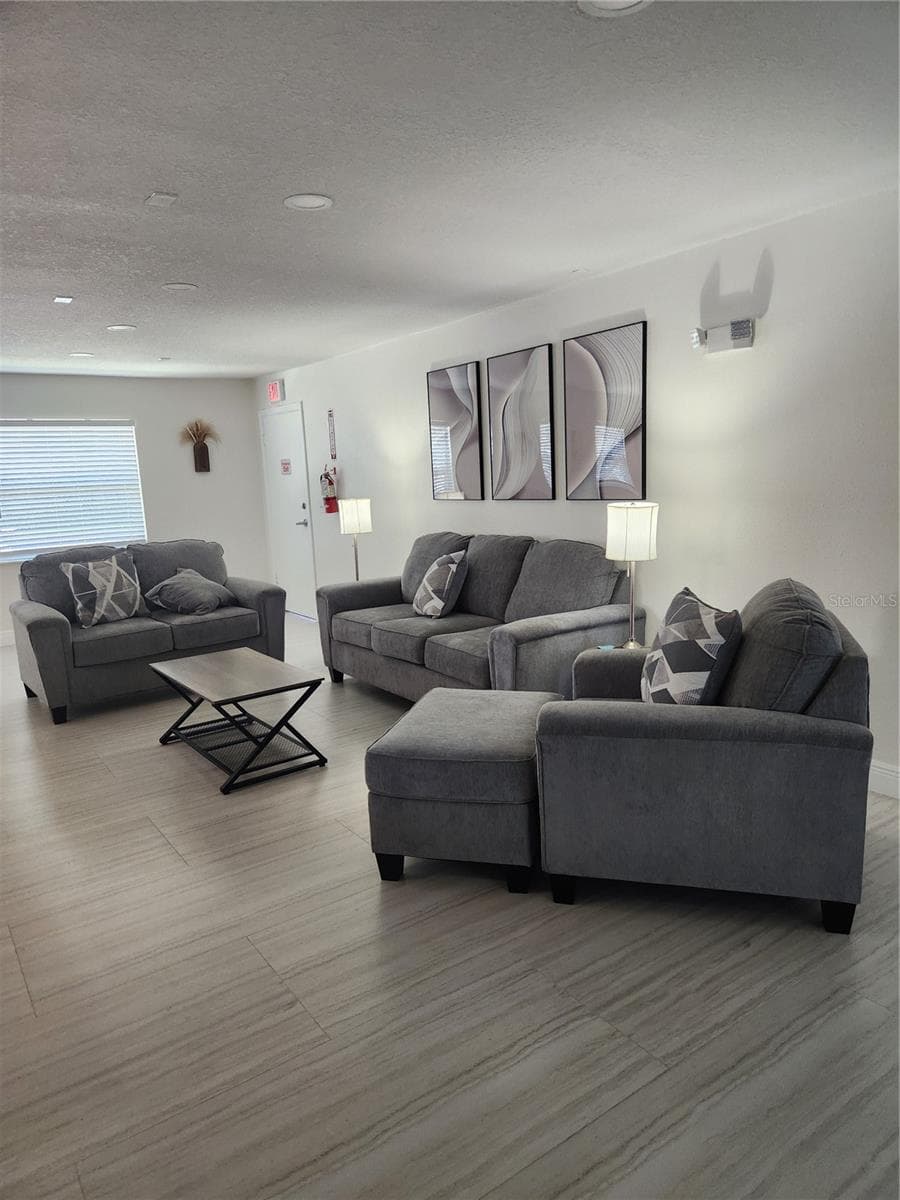 Clubhouse Living room - 9101 W HILLSBOROUGH AVE #I209, TAMPA