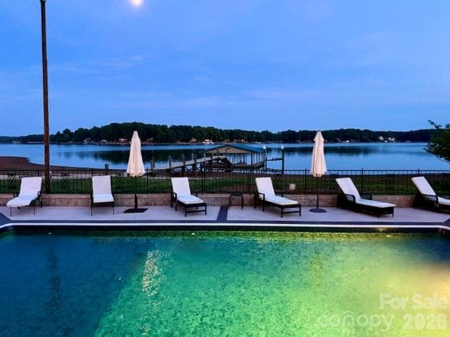 night time pool and lake - 615 Kenway Loop, Mooresville