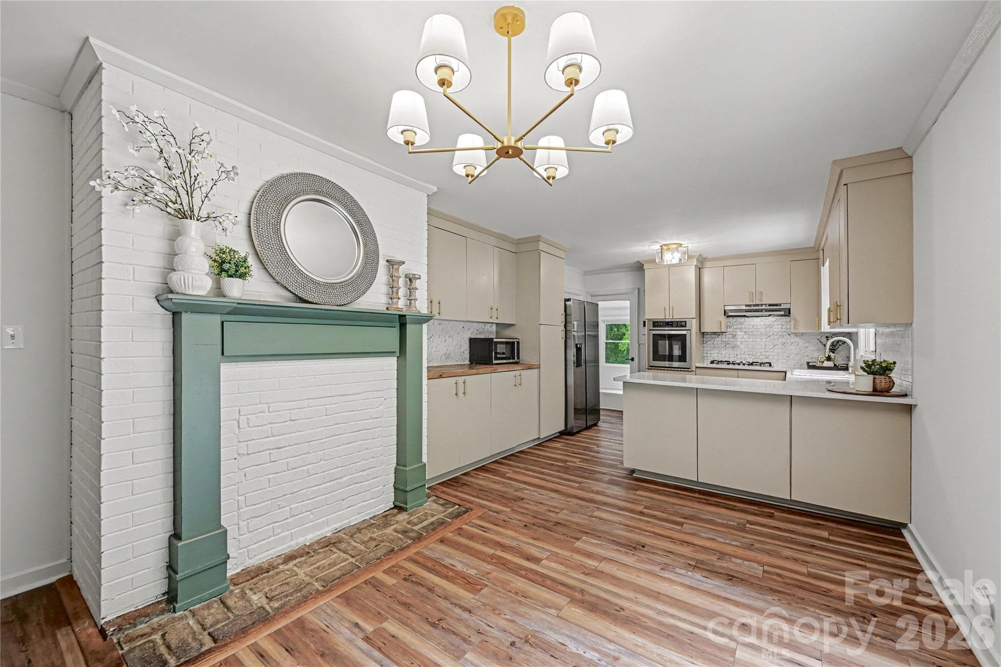 Open dining and kitchen layout creates an ideal space for entertaining, gathering, and everyday living. - Concord