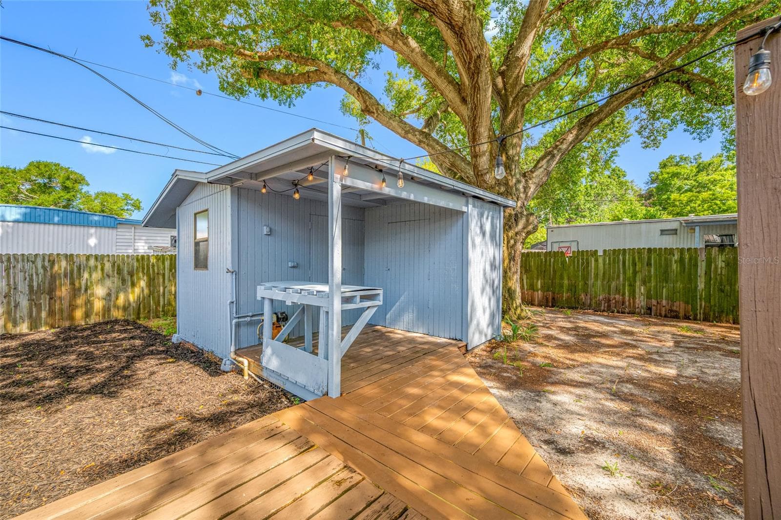 Detached workshop with built in desk, perfect for projects and hobbies - 5044 BETTY ST N, ST PETERSBURG