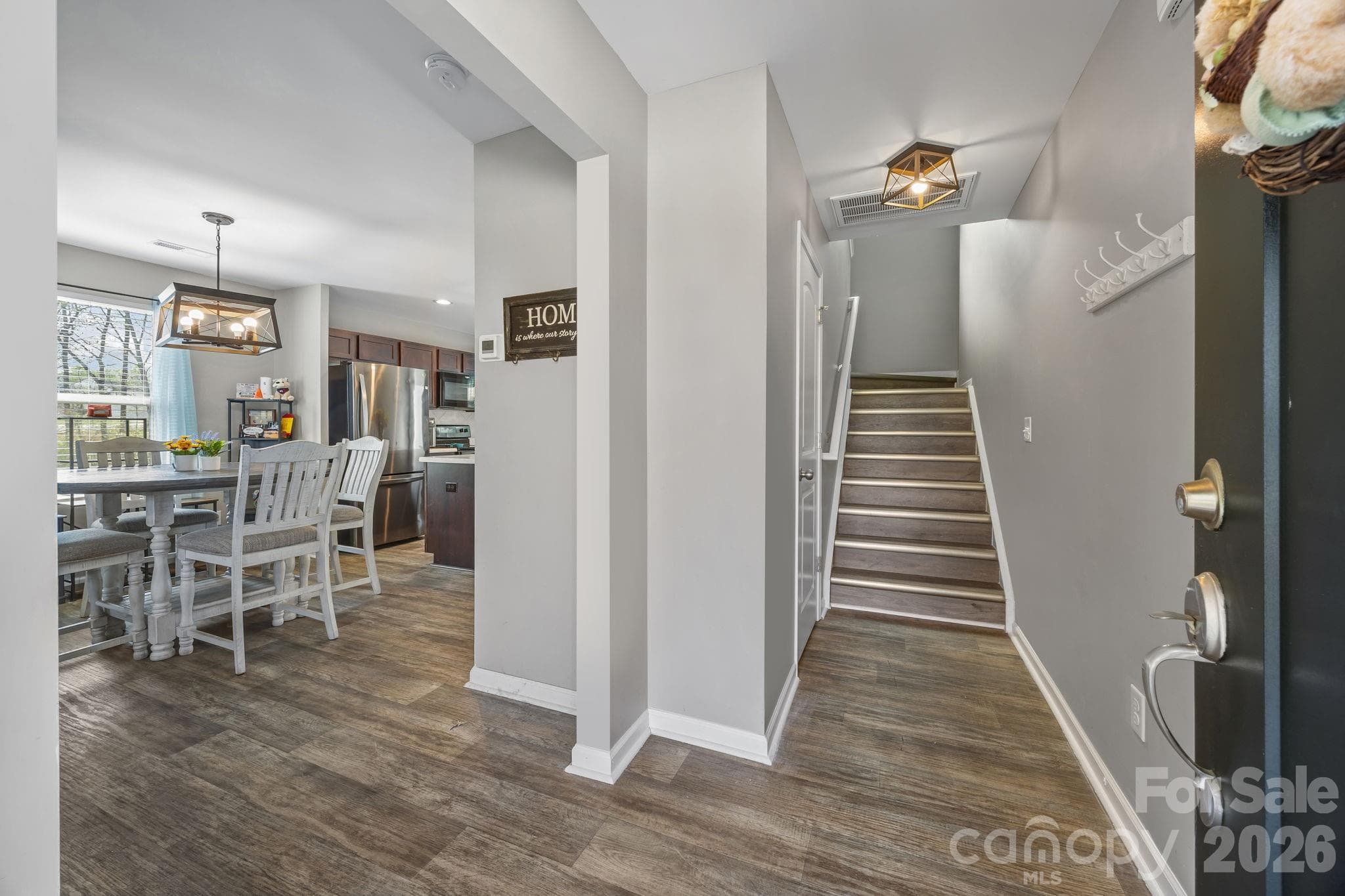 Come on in! LVP floors flow throughout the main living area and up the steps - Albemarle