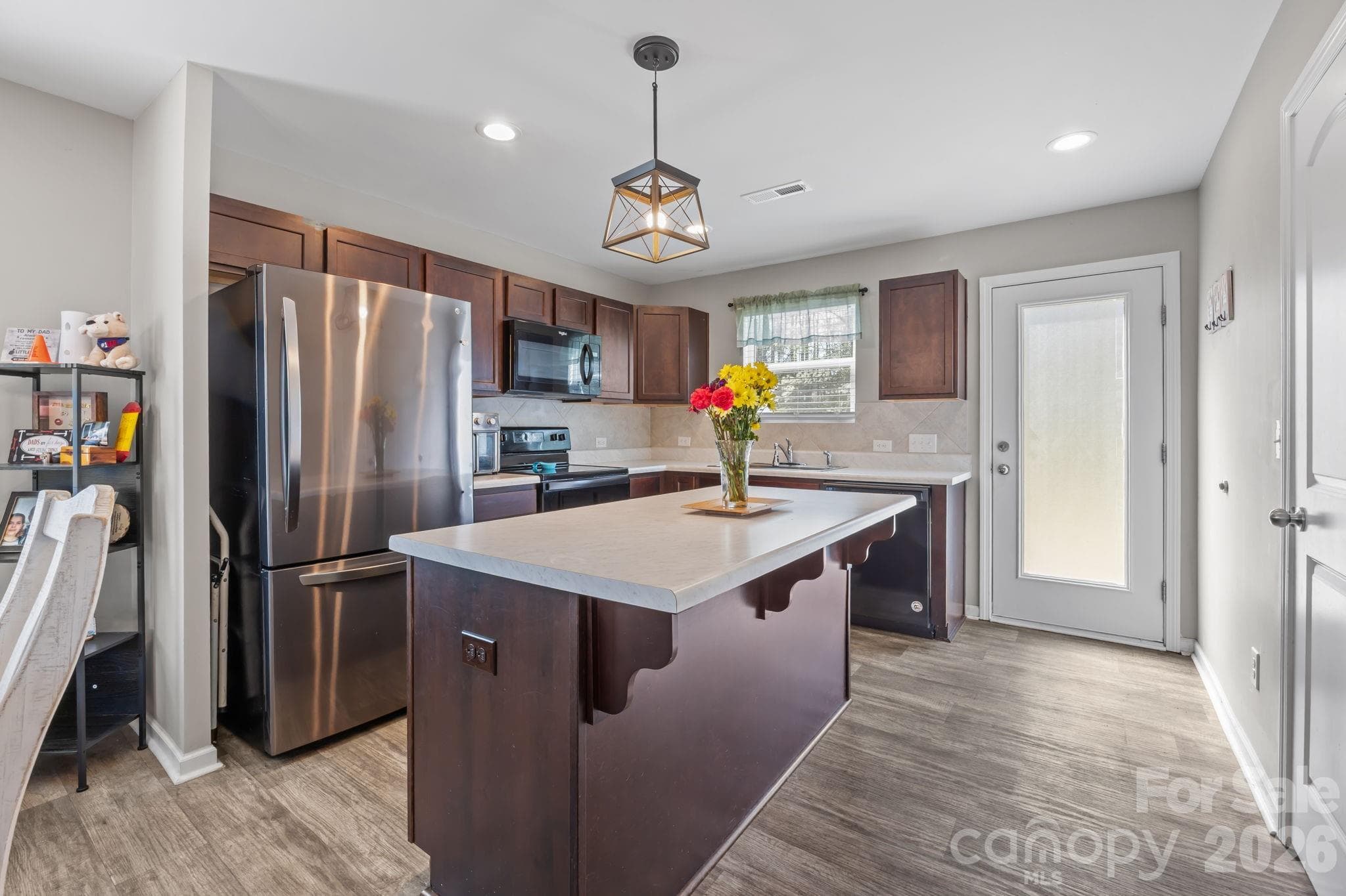 Open layout with a modern kitchen, a dining area and living room that flow together - 813 Yorkshire Drive, Albemarle