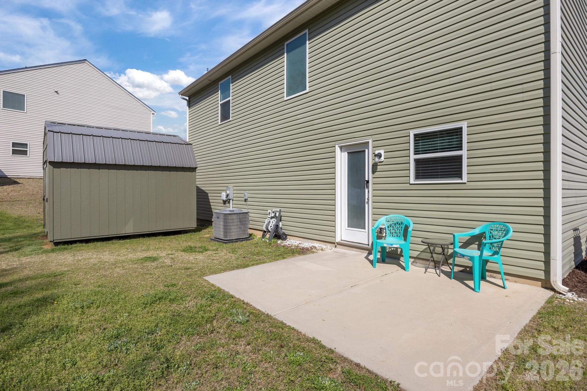 Patio for grilling in the backyard! Nice large yard (0.44 acres) for all your outdoor activities including gardening, disc golf, and cornhole. Add a firepit, a gazebo, outdoor kitchen and make an outdoor entertainment area! - Albemarle