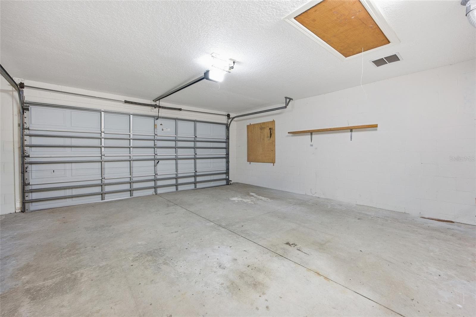 2 Car garage Attic access with pull down ladder - 4905 KELSO ST, LEESBURG